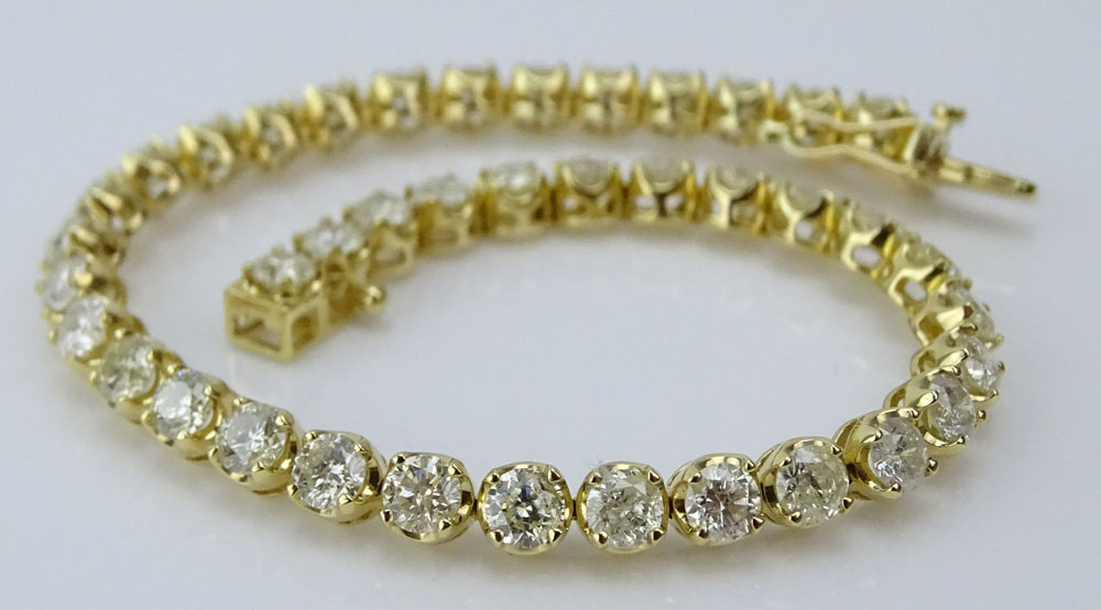 AIG Certified 8.52 Carat Round Brilliant Cut Diamond and 18 Karat Yellow Gold Tennis Bracelet.