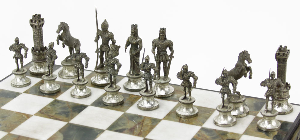 Giuseppe Vasari Italian, circa 1970 gilt metal figural chess set 