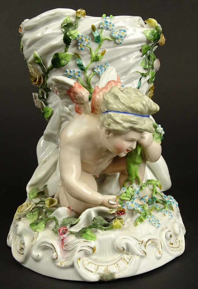 Antique Continental Meissen Style Porcelain Figural Vase. Decorated with Cherub and Flowers