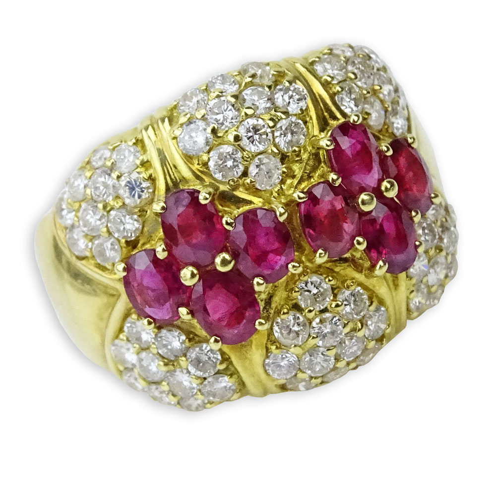 Approx. 1.63 Carat Oval Cut Ruby, 1.40 Carat Pave Set Round Brilliant Cut Diamond and 18 Karat Yellow Gold Ring.