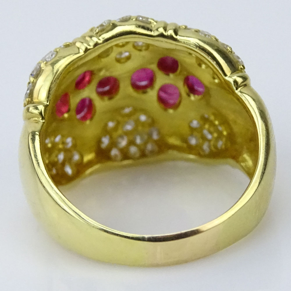 Approx. 1.63 Carat Oval Cut Ruby, 1.40 Carat Pave Set Round Brilliant Cut Diamond and 18 Karat Yellow Gold Ring.