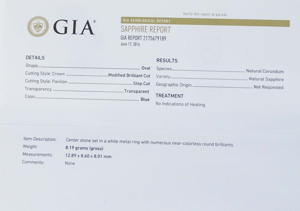 GIA and AIG Certified 8.30 Carat Oval Brilliant Cut Natural Unheated Sapphire, .67 Carat Round Brilliant Cut Diamonds and Platinum Ring. 