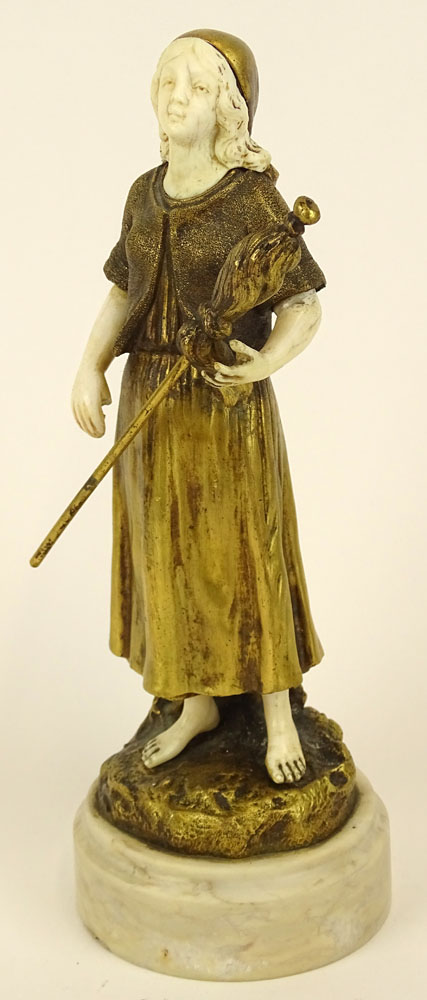 Theophile Francois Somme, French (1871-1952) Gilt bronze and ivory figure on marble base "Girl with Staff and Flag" 