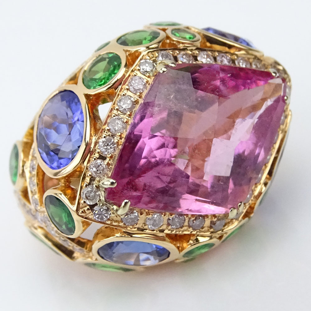 Approx. 17.0 Carat Diamond Shape Tourmaline and 18 Karat Rose Gold Ring Accented throughout with 1.30 carat Round Cut Diamonds, 5.57 Carat Tanzanites and 4.94 Carat Tsavorite Garnets. 