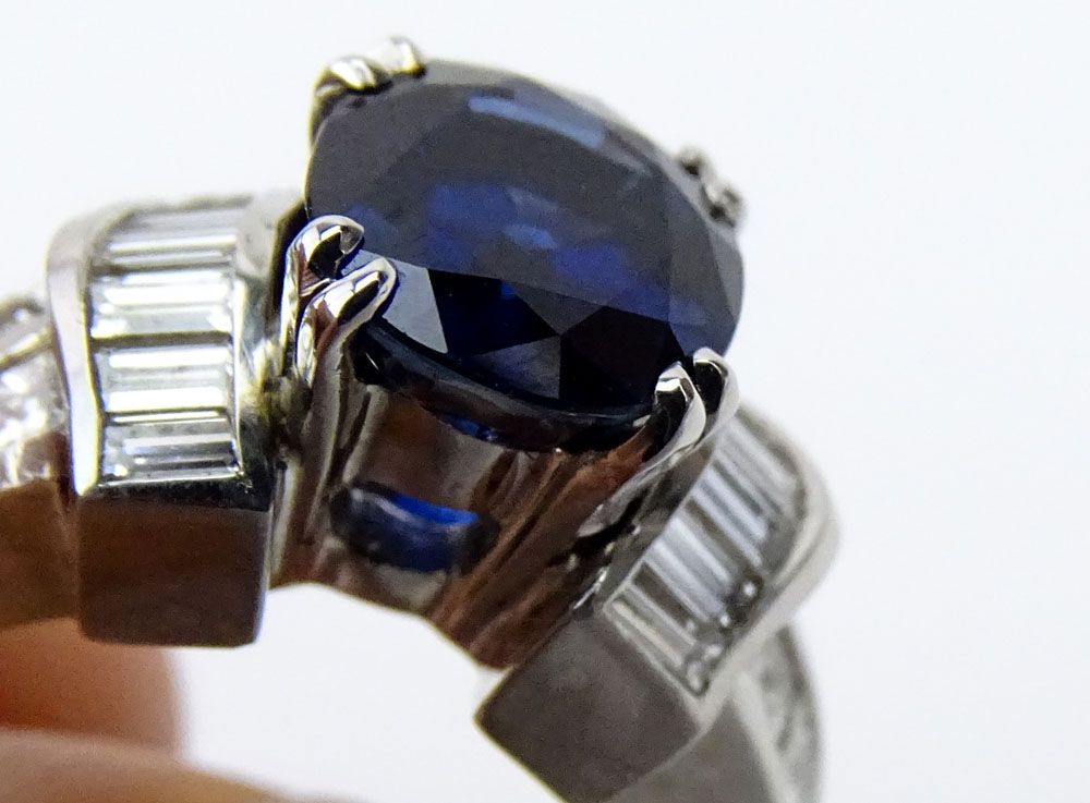 GAL Certified 2.70 Carat Oval Cut Sapphire, 2.0 Carat Round Brilliant and Baguette Cut Diamonds and 18 Karat White Gold Ring.