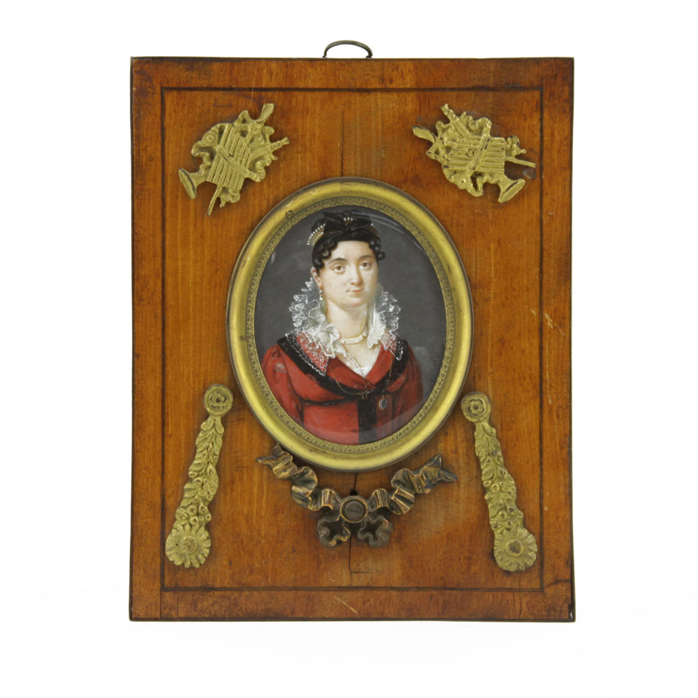 Early 19th Century Hand Painted Portrait Miniature. In wood frame with bronze decoration.