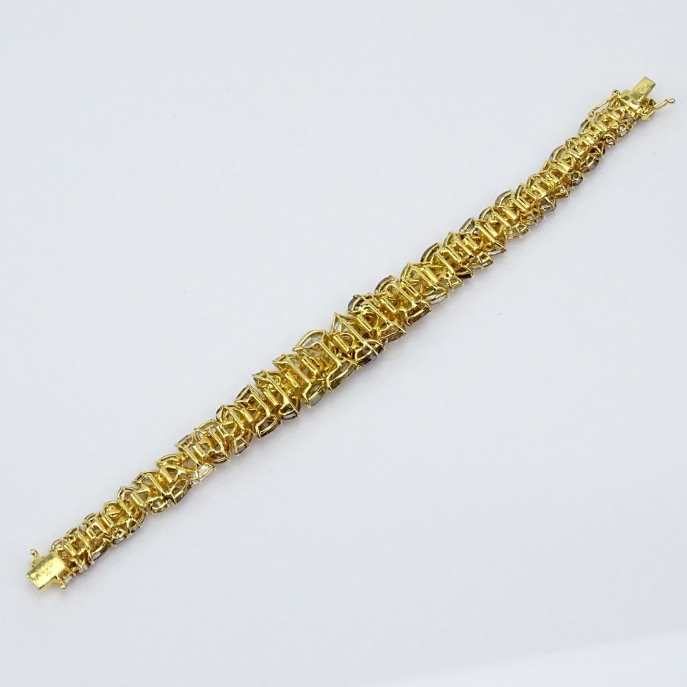 36.89 Carat Multi Cut Fancy to Fancy Deep Yellow Diamond and 18 Karat Yellow Gold Bracelet