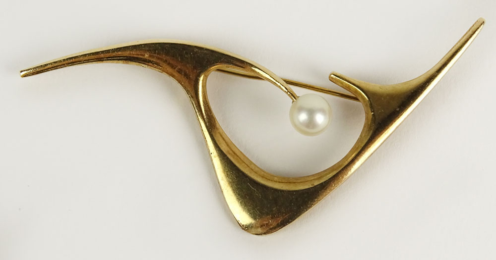 Ed Wiener, American (1918-1991) Mid 20th Century Modern 14 Karat Yellow Gold and Pearl Brooch.