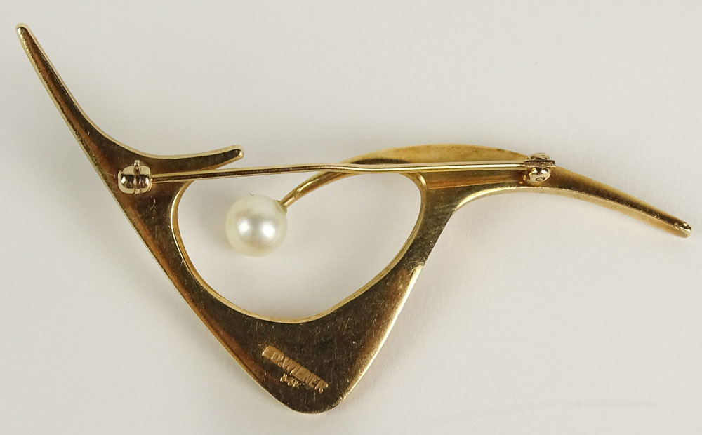 Ed Wiener, American (1918-1991) Mid 20th Century Modern 14 Karat Yellow Gold and Pearl Brooch.