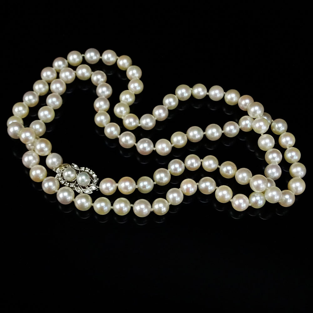 32" Single Strand White Pearl Necklace with 14 Karat White Gold, Diamond and Pearl Clasp