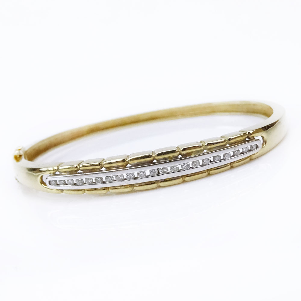 Lady's Vintage 14 Karat Yellow Gold Hinged Bangle Bracelet Accented with Small Round Cut Diamonds