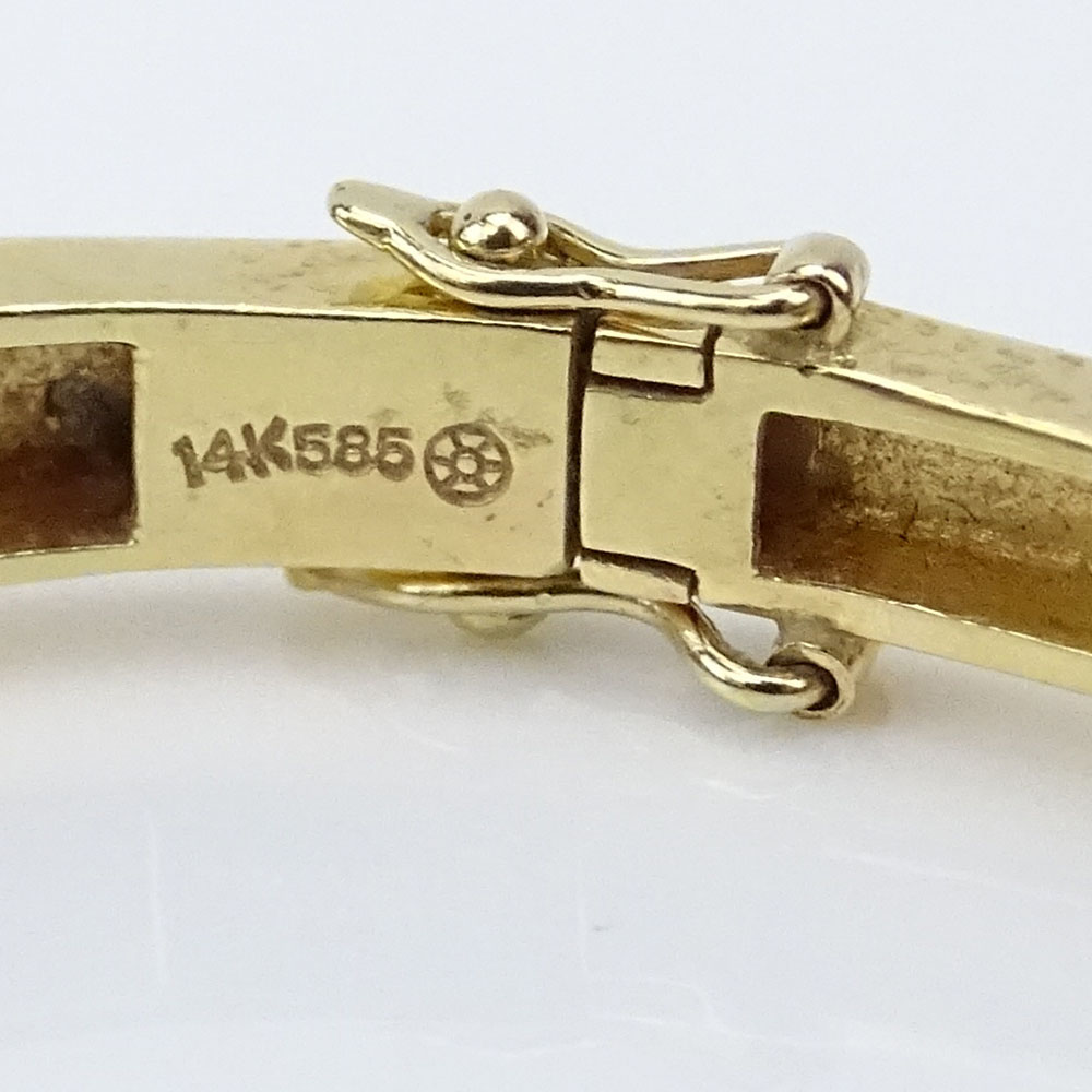 Lady's Vintage 14 Karat Yellow Gold Hinged Bangle Bracelet Accented with Small Round Cut Diamonds