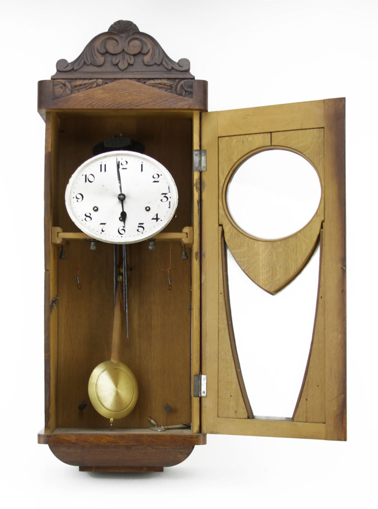 Antique French Art Deco Carved Wood Wall Clock. Includes key and pendulum, missing weights