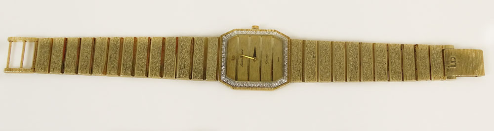 Man's Vintage Lucien Picard 14 Karat Yellow Gold Quartz Bracelet Watch with Bezel accented with small Diamonds