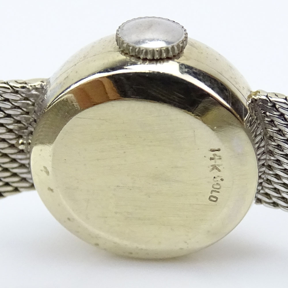 Vintage 14 Karat White Gold Omega "Ladymatic" Bracelet Watch. Signed 14K. 