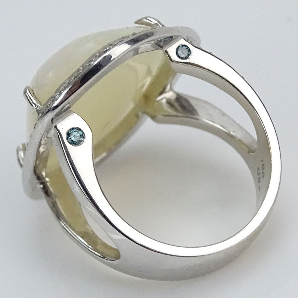 Large White Opal, Round Brilliant Cut Diamond, Blue Diamond and 18 Karat White Gold Ring