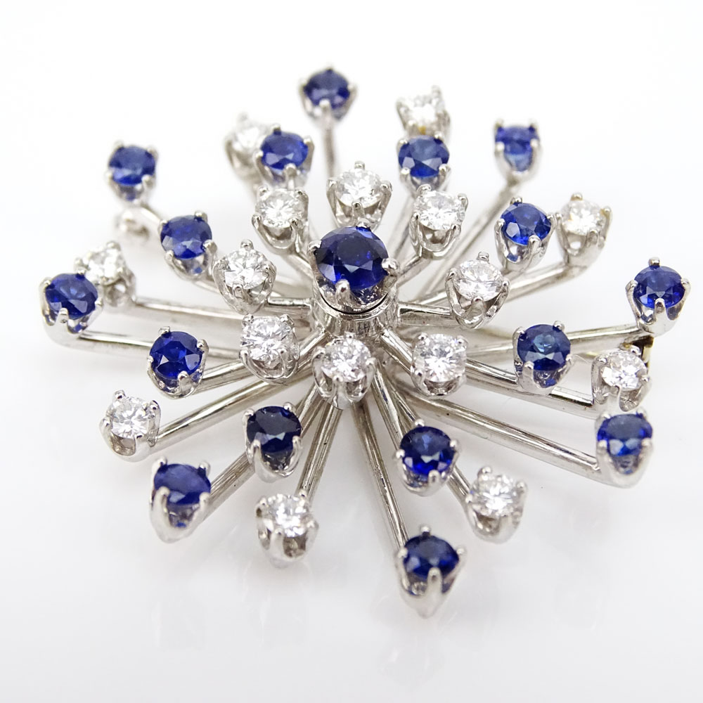 Vintage Approx. 1.80 Carat Round Brilliant Cut Diamond, 2.0 Carat Round Brilliant Cut Sapphire and Platinum Starburst Pendant/Brooch