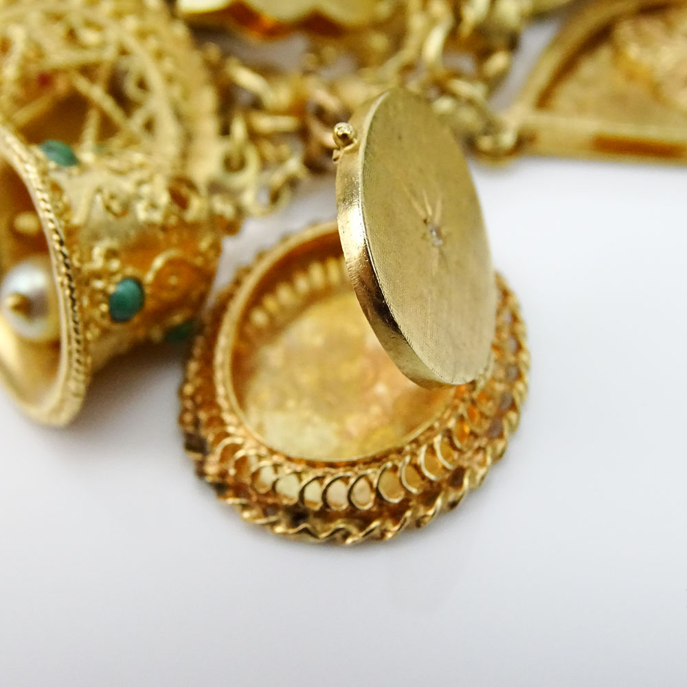 Vintage Heavy 14 Karat Yellow Gold Charm Bracelet with Nineteen (18) Assorted Interesting Charms