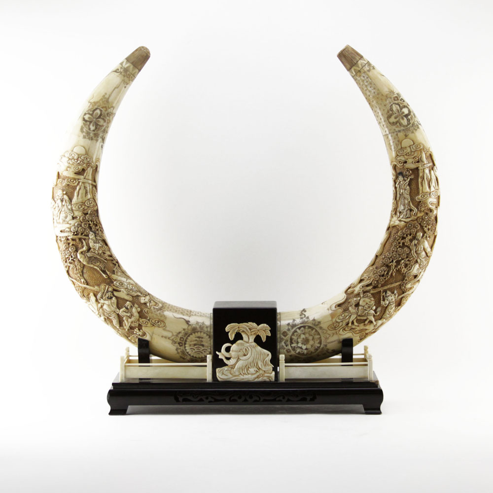 Pair of Carved Bone Polychrome Tusks in Wooden Stands