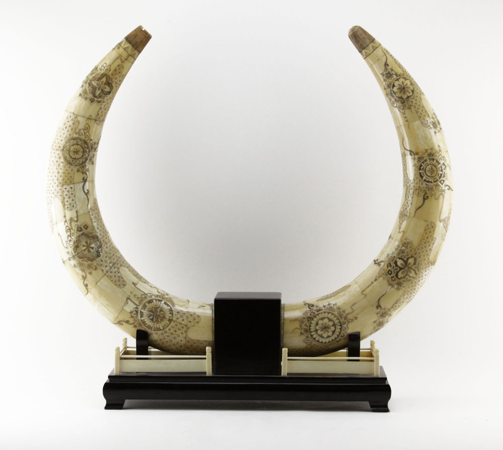 Pair of Carved Bone Polychrome Tusks in Wooden Stands