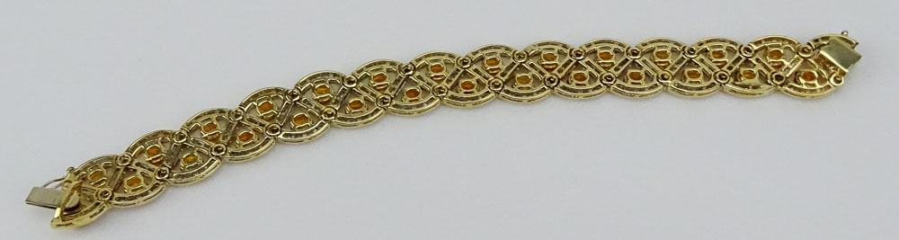 Fine Quality Approx. 12.50 Carat Oval Cut Yellow Sapphire, 5.0 Carat Round Brilliant Cut Diamond and 18K Yellow Gold Bracelet