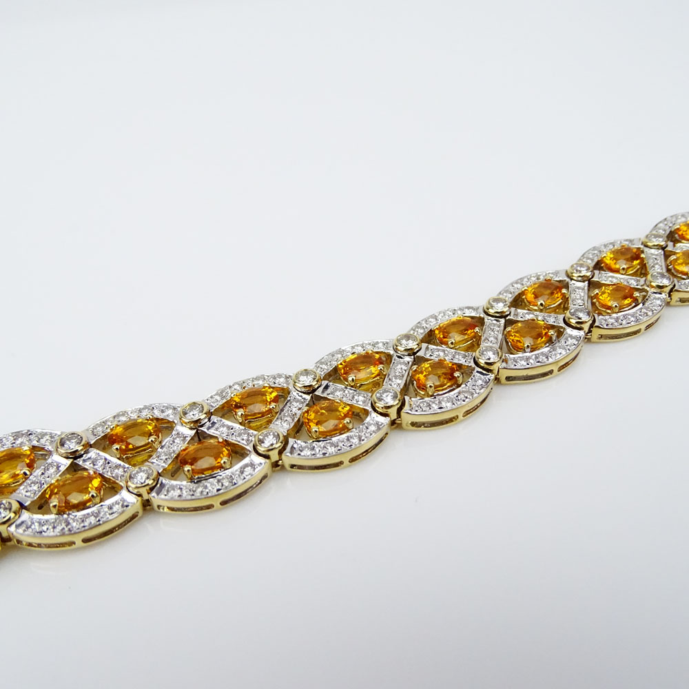 Fine Quality Approx. 12.50 Carat Oval Cut Yellow Sapphire, 5.0 Carat Round Brilliant Cut Diamond and 18K Yellow Gold Bracelet