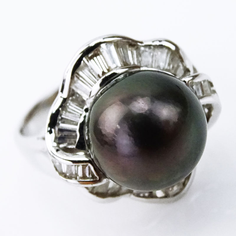 11mm South Sea Black Pearl, Baguette Cut Diamond and 18 Karat White Gold Ring. 