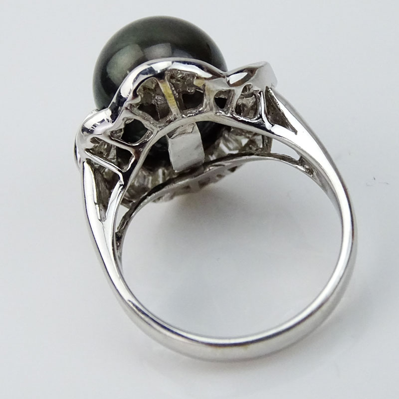 11mm South Sea Black Pearl, Baguette Cut Diamond and 18 Karat White Gold Ring. 