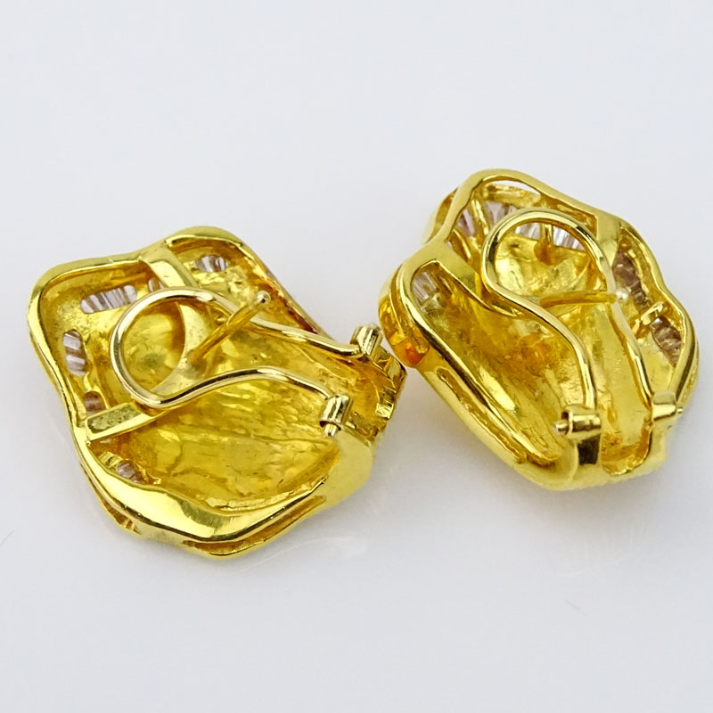 Pair of 18 Karat Yellow Gold Earrings Accented throughout with Tapered Baguette Cut Diamonds.