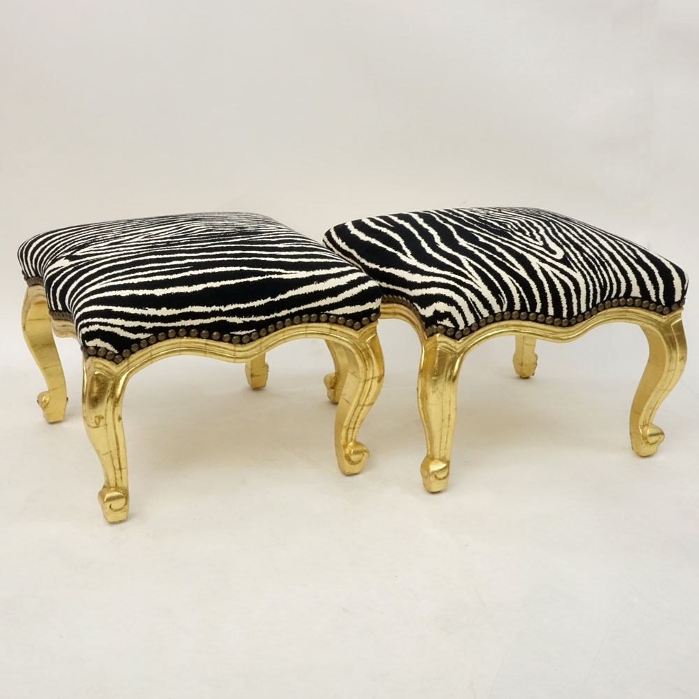 Pair of Vintage Louis XV style Carved and Gold-Leafed Tabourets with Faux Zebra Upholstery.