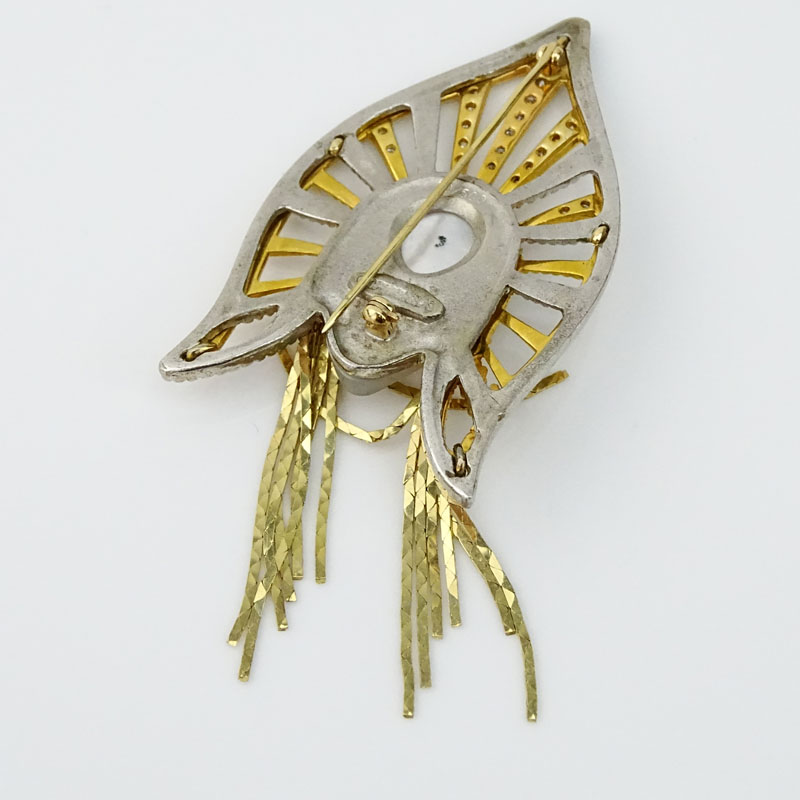 Erte, French (1892-1990) Vintage 14 Karat Yellow Gold, Sterling Silver, Diamond, Sapphire and Mother of Pearl Brooch