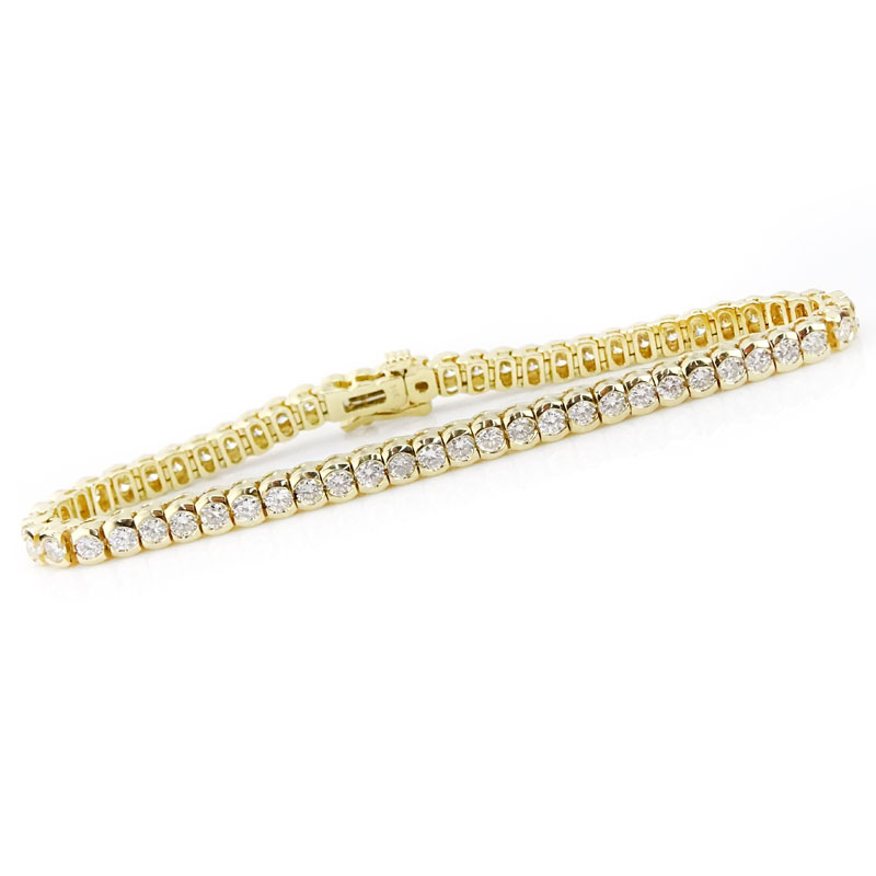 Vintage Approx. 8.0 Carat Round Brilliant Cut Diamond and 14 Karat Yellow Gold Tennis Bracelet