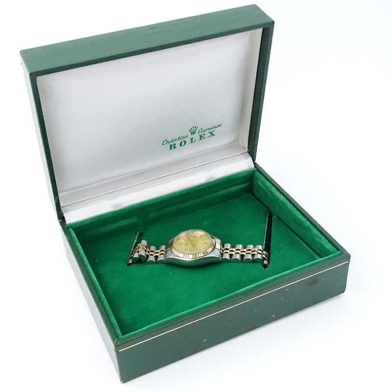 Lady's Circa 1979 Rolex Oyster Perpetual Date Stainless Steel and 14 Karat Yellow Gold Watch