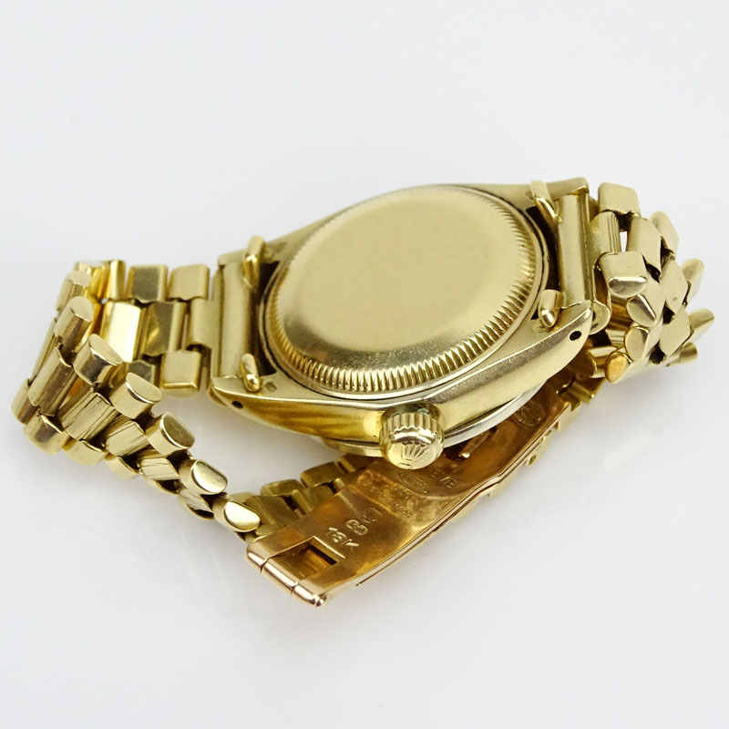 Lady's Vintage Rolex 18 Karat Yellow Gold Oyster Perpetual Datejust with Diamond Bezel and Hour Markers