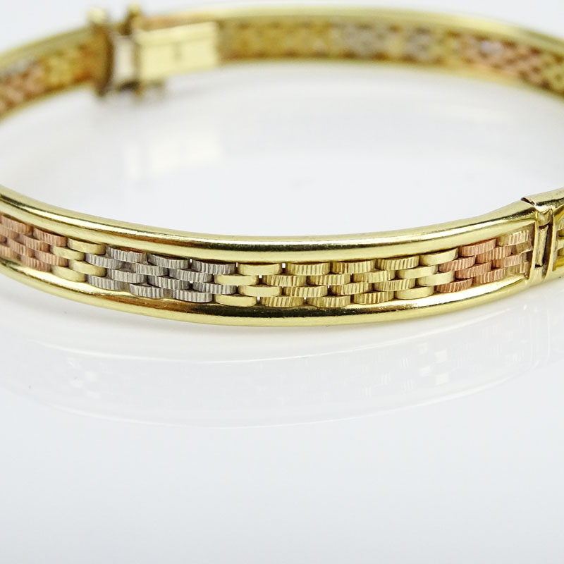 Two (2) Vintage 14 Karat Gold Bangle Bracelets, one Tri-color Gold, one Yellow Gold