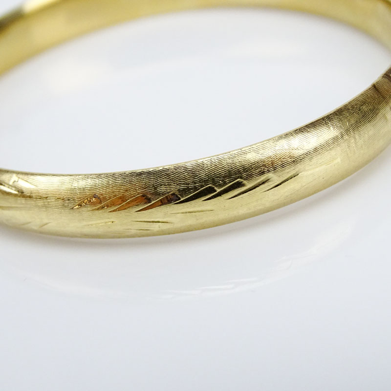 Two (2) Vintage 14 Karat Gold Bangle Bracelets, one Tri-color Gold, one Yellow Gold