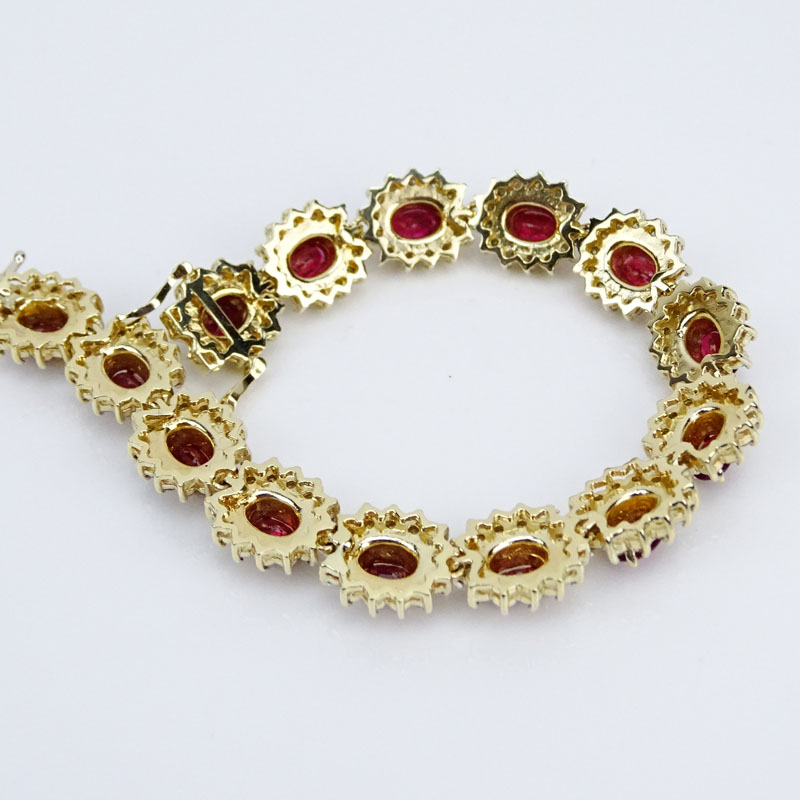  6.50 Carat Oval Cut Ruby, 3.70 Carat Diamond and 14 Karat Yellow Gold Bracelet.