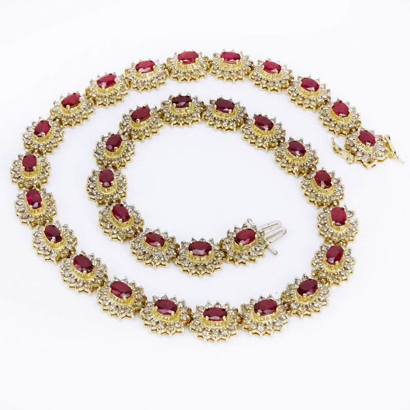 15.00 Carat Oval Cut Ruby, 8.75 Carat Diamond and 14 Karat Yellow Gold Necklace. 