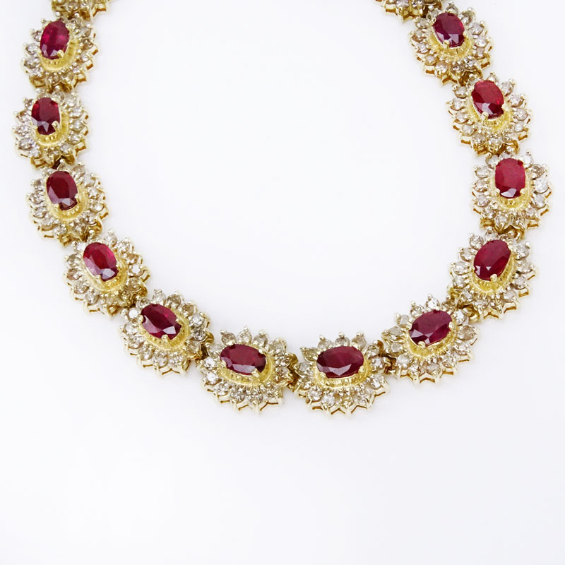 15.00 Carat Oval Cut Ruby, 8.75 Carat Diamond and 14 Karat Yellow Gold Necklace. 