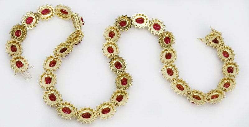 15.00 Carat Oval Cut Ruby, 8.75 Carat Diamond and 14 Karat Yellow Gold Necklace. 