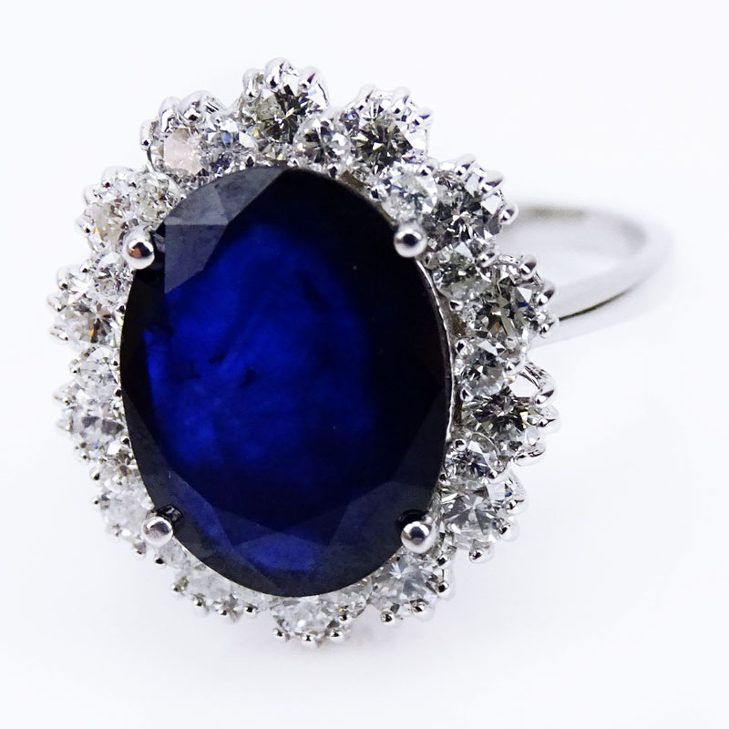  5.0 Carat Oval Cut Sapphire, 1.75 Carat Round Brilliant Cut Diamond and 14 Karat White Gold Ring. 