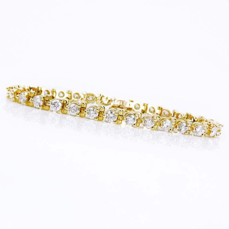 6.05 Carat Round Brilliant Cut Diamond and 14 Karat Yellow Gold Line Bracelet.