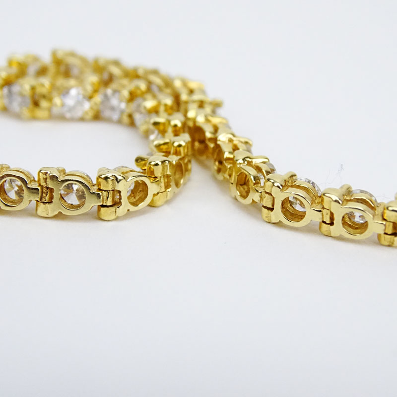 6.05 Carat Round Brilliant Cut Diamond and 14 Karat Yellow Gold Line Bracelet.