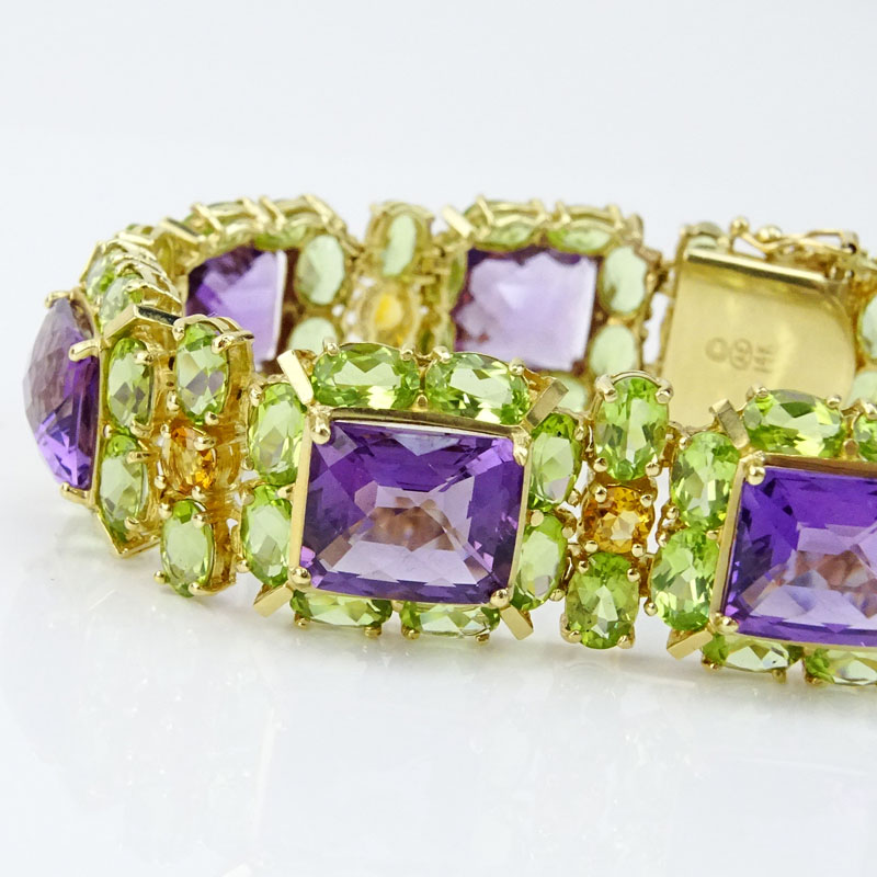 Retro Circa 1950s Amethyst, Peridot, Citrine and 14 Karat Yellow Gold Bracelet