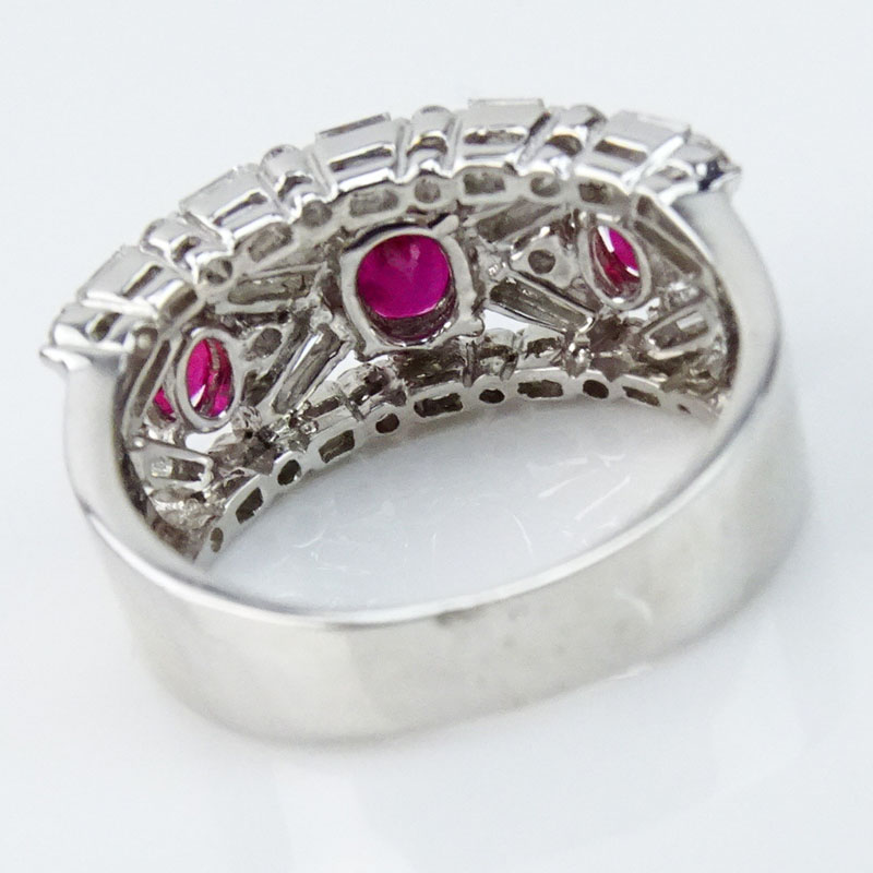 2.50 Carat Round Brilliant and Baguette Cut Diamond, Oval Cut Ruby and 18 Karat White Gold Ring.