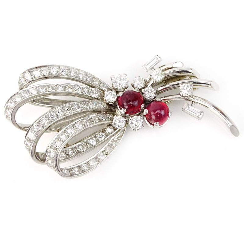 French Circa 1930 Approx. 2.50 Carat Diamond, 1.0 Carat Cabochon Ruby and Platinum Brooch. 