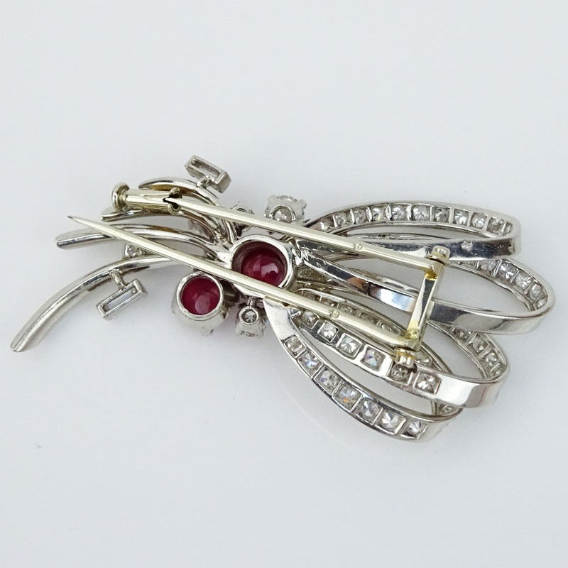 French Circa 1930 Approx. 2.50 Carat Diamond, 1.0 Carat Cabochon Ruby and Platinum Brooch. 