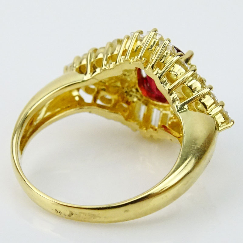 1.86 Carat Cushion Cut Ruby, 1.67 Carat Round Brilliant and Baguette Cut Diamond and 18 Karat Yellow Gold Ring.