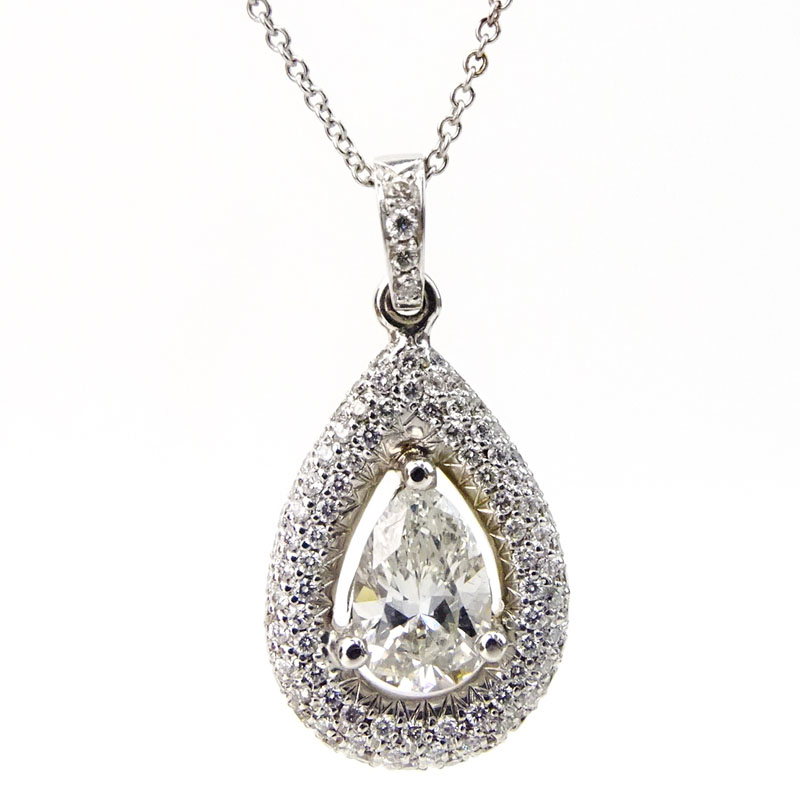 98 Carat Pear Shape Diamond and 18 Karat White Gold pendant accented with .54 Carat Round Brilliant Cut Diamonds and with 14 Karat White Gold Chain