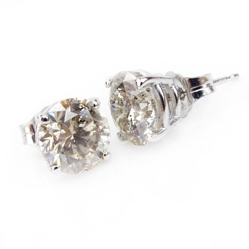 3.09 Carat Round Brilliant Cut Diamond and 14 Karat White Gold Ear Studs.